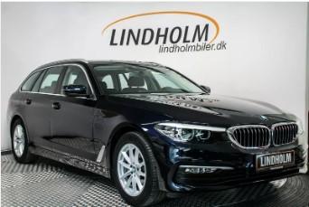 Sort BMW 520d på fotorampe